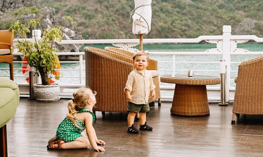 kids playing around on sundeck on Halong Bay Cruise